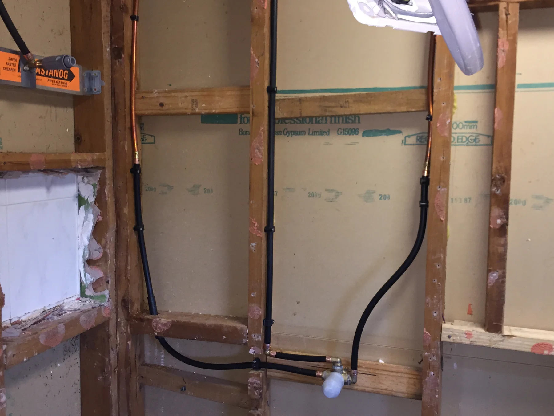 Plumbing installation in progress during a renovation.